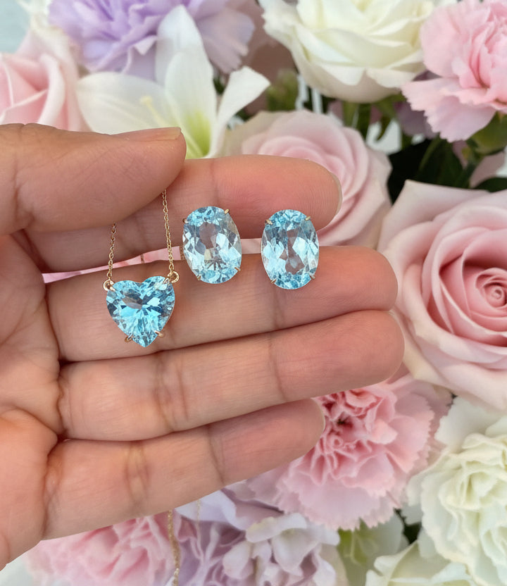 Aritos en oro de 14k, Topacio Sky Blue natural
