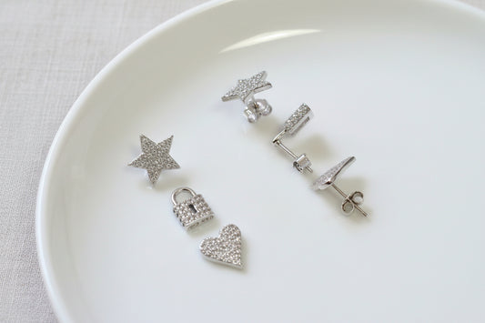 Aritos mini stud de formas de estrella, corazón, candado