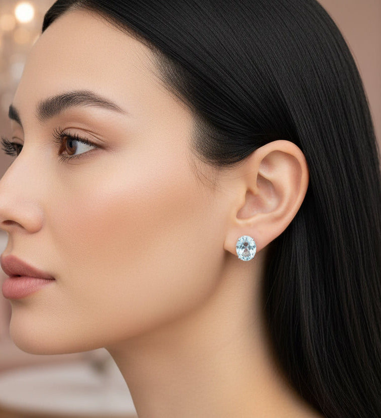 Aritos en oro de 14k, Topacio Sky Blue natural