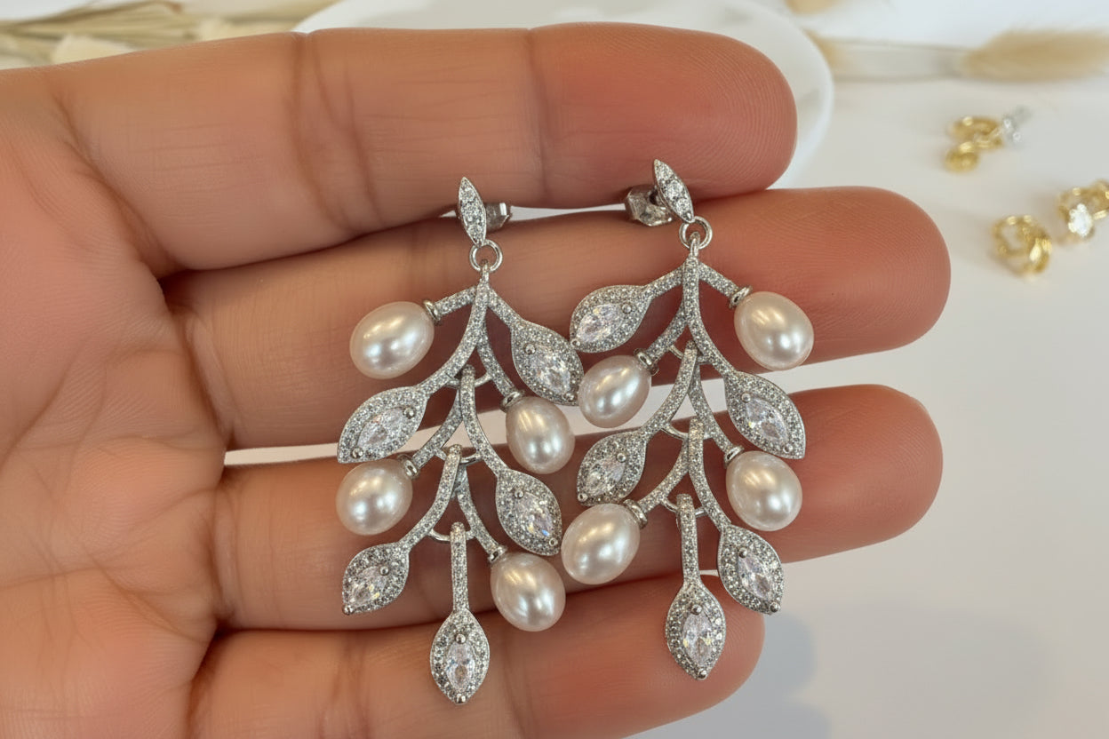 Aritos de perlas naturales de rio, plata925 y zircones