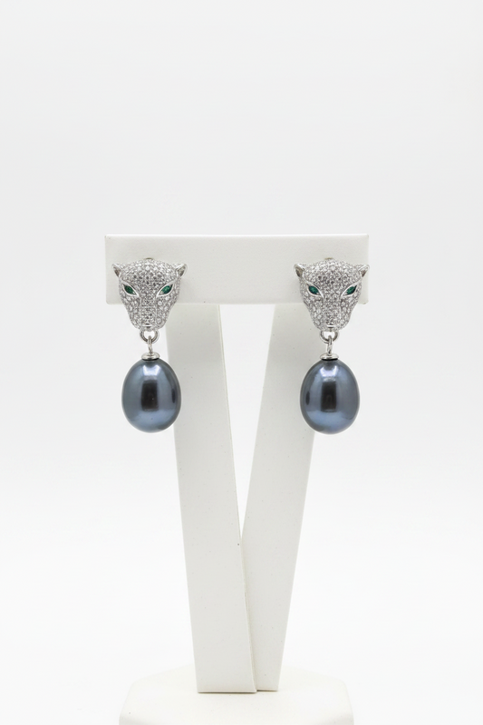Aretes con cara de jaguar y Perlas naturales de río negras